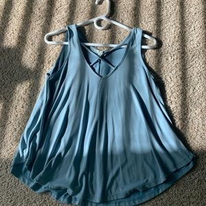 soft blue with cross strings on chest